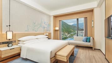 Suite ejecutiva, 1 cama de matrimonio grande, vistas a la ciudad | Colchones con acolchado adicional, caja fuerte, escritorio