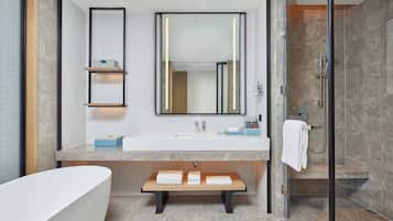 Separate bathtub and shower, rainfall showerhead, free toiletries