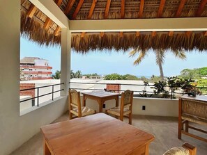 Outdoor dining - Casa Aymara 402: Balcony & Beach Walk (Brisas de Zicatela)