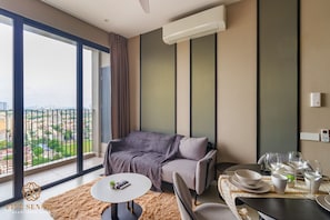 Two Bedrooms Suite | Área de estar | Smart TV, Netflix, serviços de streaming