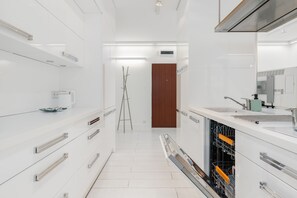 Apartment, 1 Bedroom, Balcony | Private kitchen | Dishwasher, coffee/tea maker, cookware/dishes/utensils - Minimalist Apartment Poznan by Renteres (Poznan)