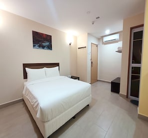 Suíte família | 1 quarto, escrivaninha, espaço de trabalho para notebook
