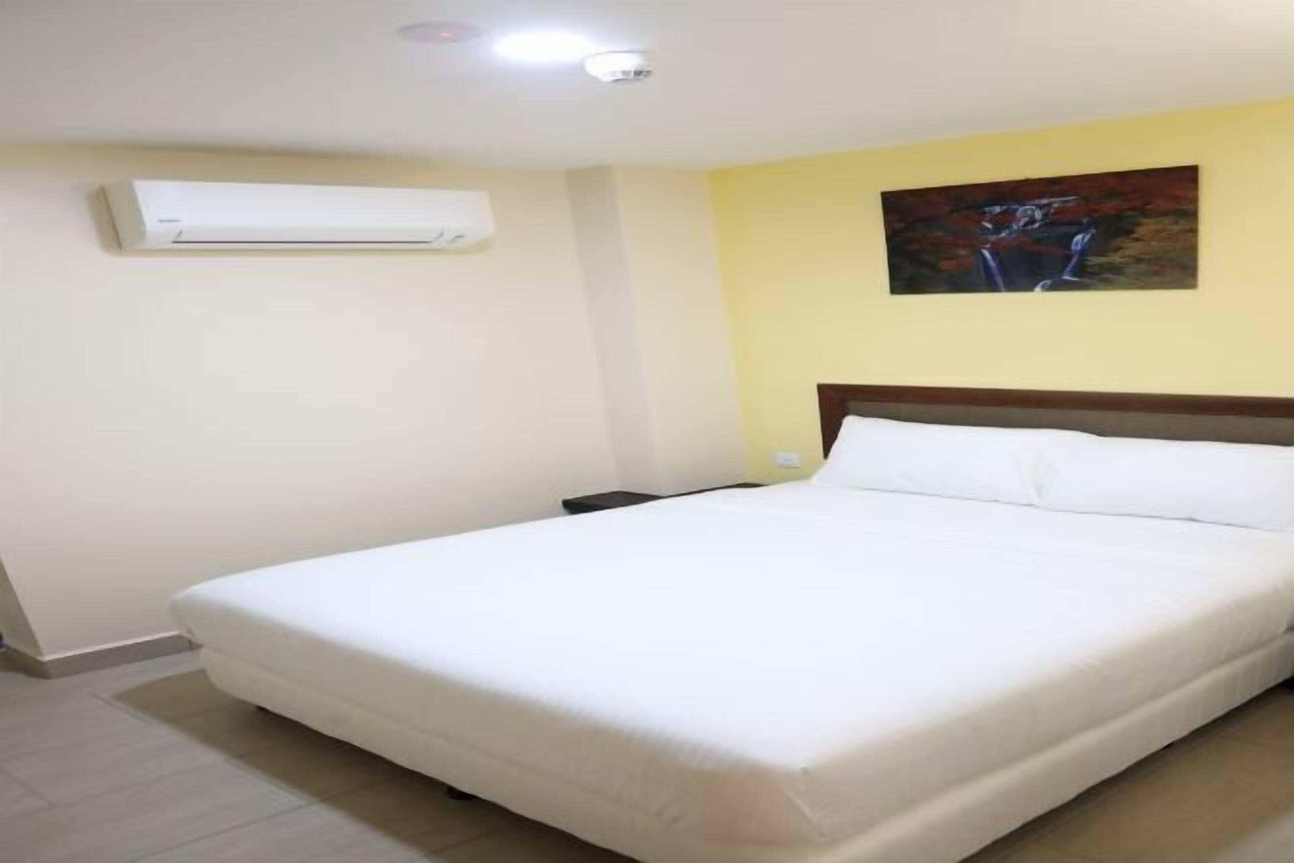 Desk, laptop workspace, free WiFi, bed sheets