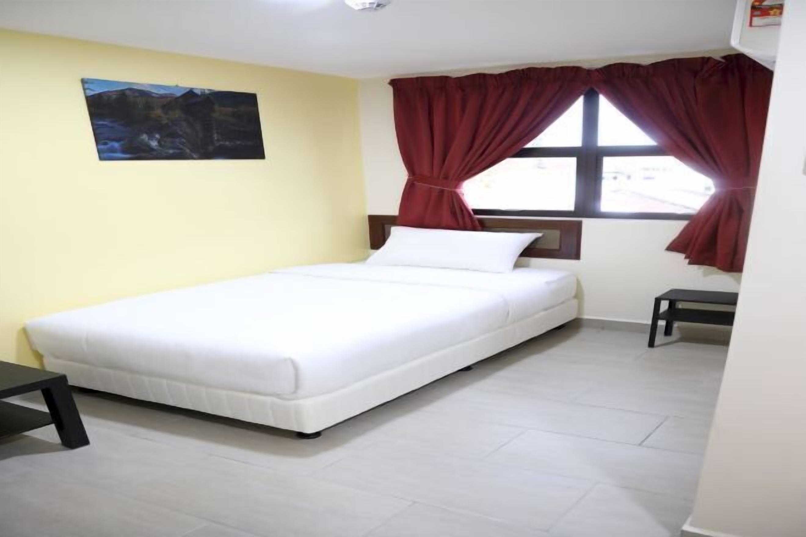 Desk, laptop workspace, free WiFi, bed sheets