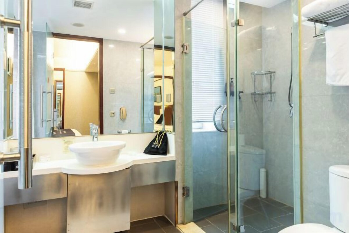 Baño | Regadera y toallas