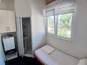 Chambre Simple | 1 chambre, Wi-Fi gratuit, draps fournis