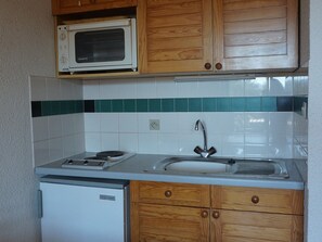 Fridge, microwave, coffee/tea maker, toaster