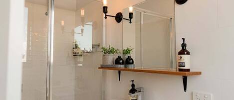Shower, hair dryer, towels