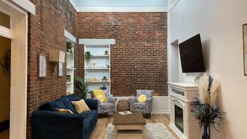 Smart TV, fireplace, books