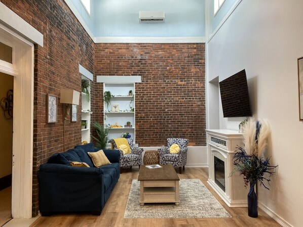 Smart TV, fireplace, books