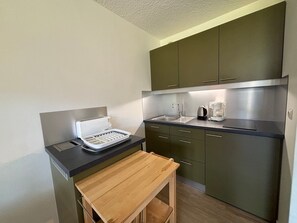 Fridge, microwave, coffee/tea maker, toaster