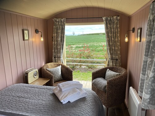 Luxury Glamping Kent Coast; Shepherds Huts & Safari Tents on Site hot tub