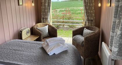 Luxury Glamping Kent Coast; Shepherds Huts & Safari Tents on Site hot tub