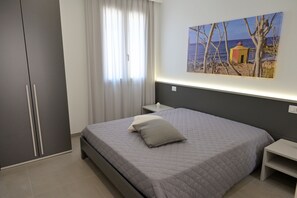 2 dormitorios, tabla de planchar con plancha, wifi