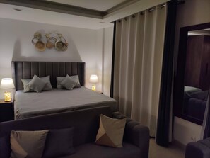 1 slaapkamer, een strijkplank/strijkijzer, wifi, beddengoed