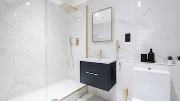 Shower, eco-friendly toiletries, hair dryer, bidet