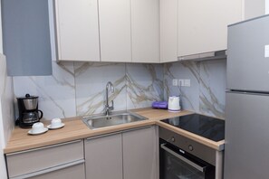 Apartment | Private kitchen - Stylish Brand New Apt at Megaro Mousikis (Athens)