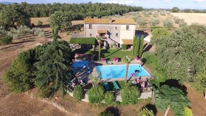 A two-story house with a swimming pool, surrounded by greenery and trees. - 9 Bedroom Private vacation home in Lazio (Lazio)