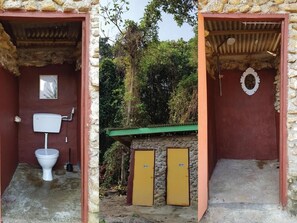 A rustic bathroom with a toilet, sink, and two yellow doors. - Harrera Perhentian Long Beach (Pulau Perhentian Kecil)