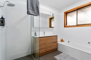 Shower, hair dryer, towels, soap