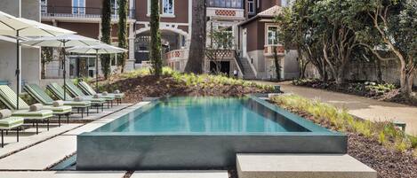 Outdoor pool, pool umbrellas, sun loungers