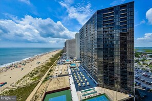 Enjoy beach access and tennis courts on our rooftop.