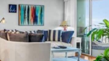 Smart TV, fireplace, books, stereo