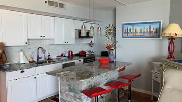 Coffee/tea maker, fridge, microwave, oven