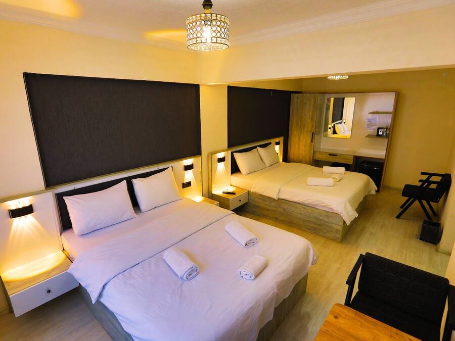 Standard Quadruple Room | In-room safe, desk, laptop workspace, free WiFi