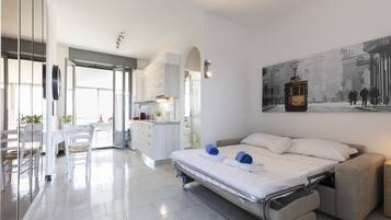 Departamento panorámico | Área de sala de estar | Smart TV