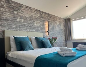 Chambre luxueuse double ou avec lits jumeaux | Bureau, accès au Wi-Fi (inclus)