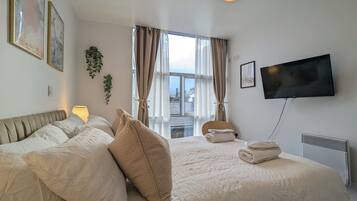 1 slaapkamer, een bureau, een strijkplank/strijkijzer, gratis wifi