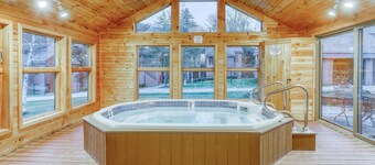 First-floor condo with indoor pool, hot tub, fitness room, & game room