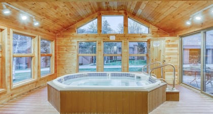 First-floor condo with indoor pool, hot tub, fitness room, & game room