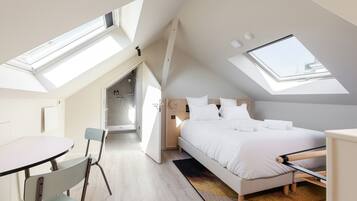 Studio | Rideaux occultants, chambres insonorisées, fer et planche à repasser