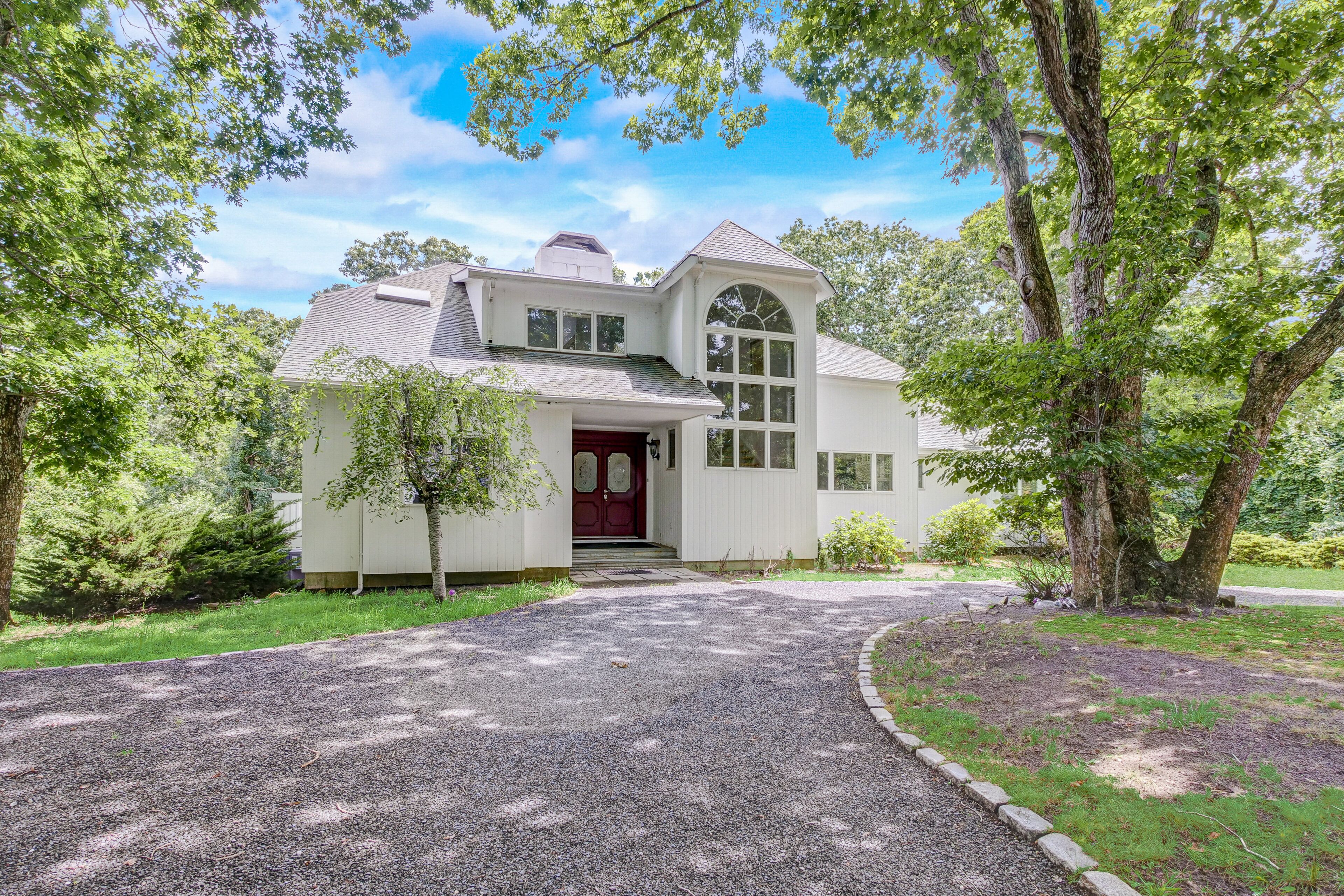 Sprawling sun-lit home with private heated pool, arcade, air hockey, & grill