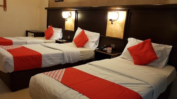 Habitación triple estándar | Minibar, wifi gratis y ropa de cama 
