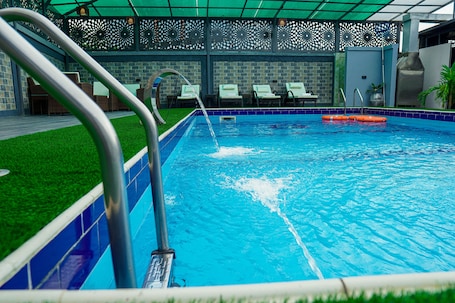 Outdoor pool, sun loungers