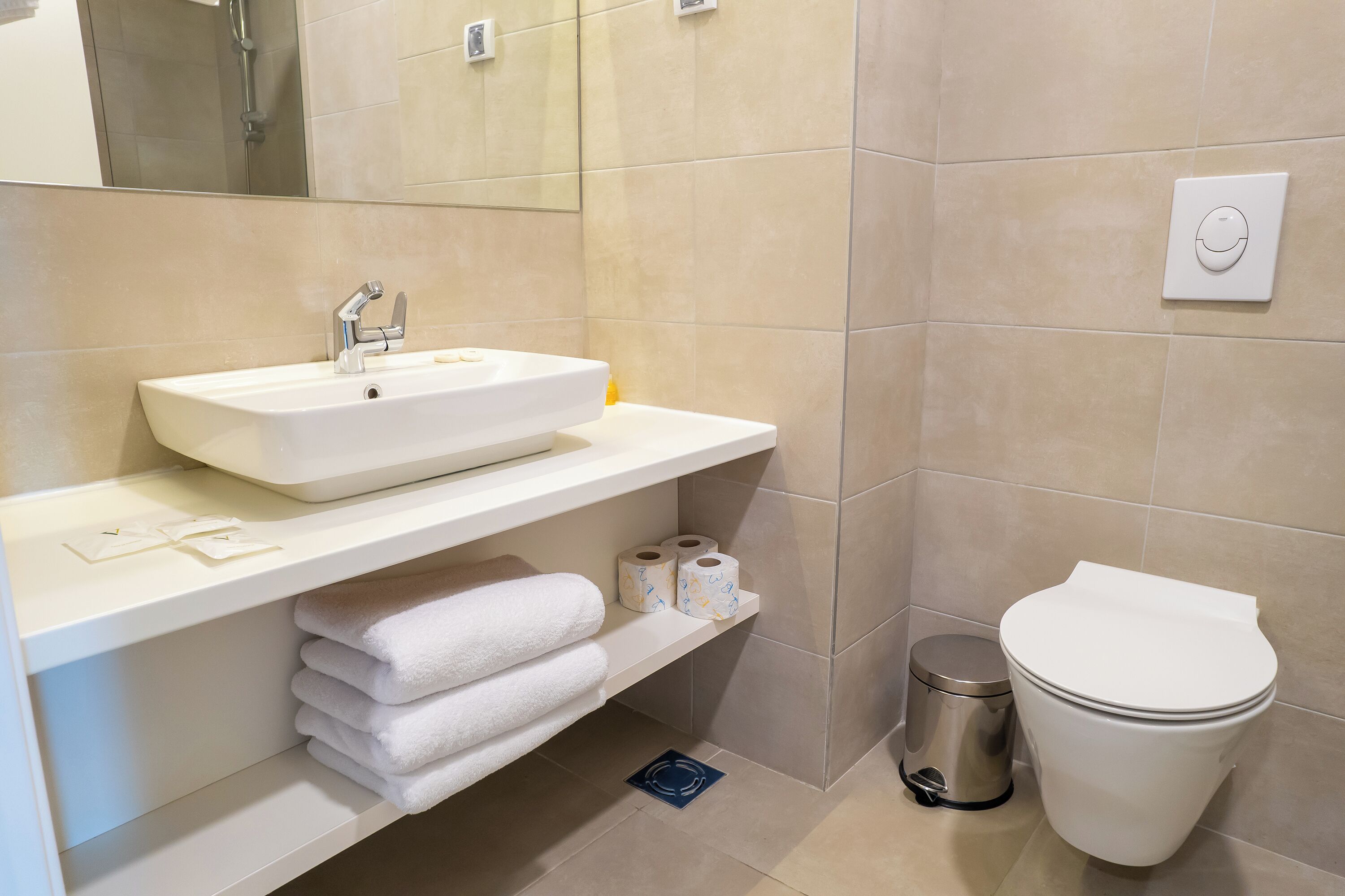 basic triple room | bathroom | shower, rainfall showerhead, hair dryer, towels