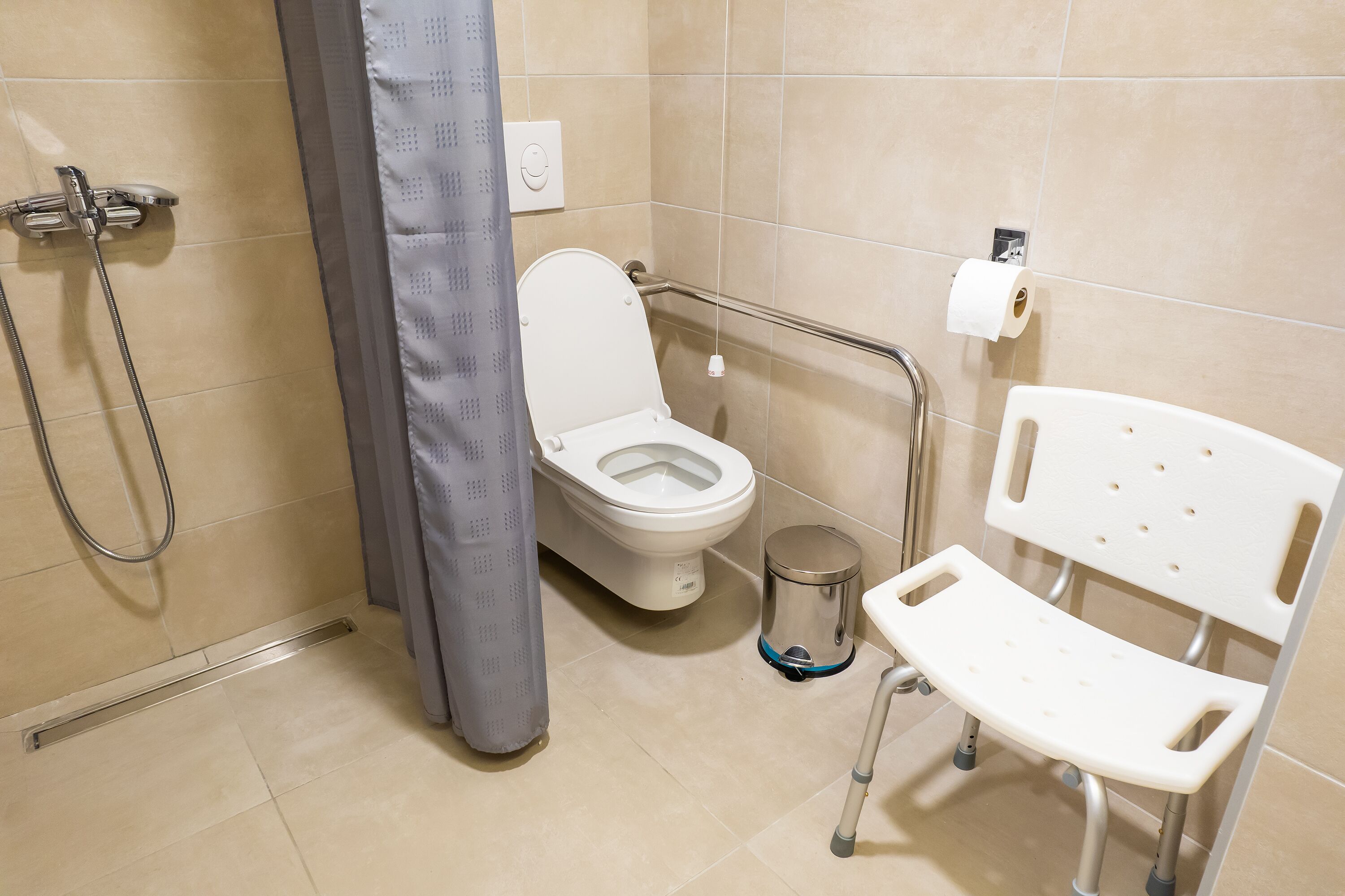 shower, rainfall showerhead, hair dryer, towels