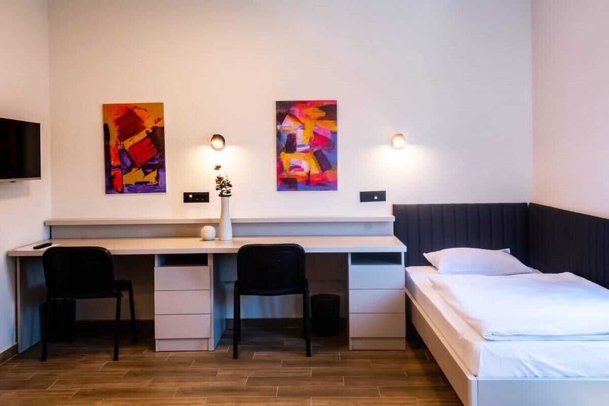 basic triple room | minibar, in-room safe, desk, blackout curtains