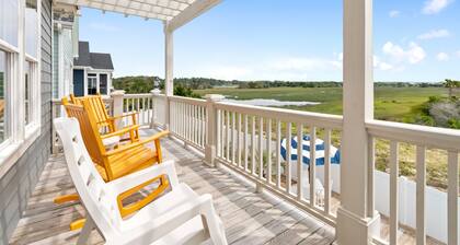 4 bedroom home with private pool. Close walk to beach and beautiful marsh views.