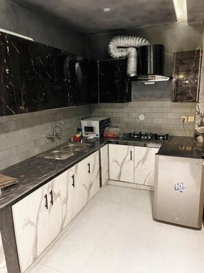 Kahden hengen deluxe-huone | Yksityinen keittiö