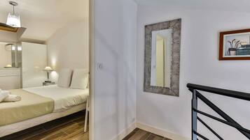 1 slaapkamer, een strijkplank/strijkijzer, wifi, beddengoed