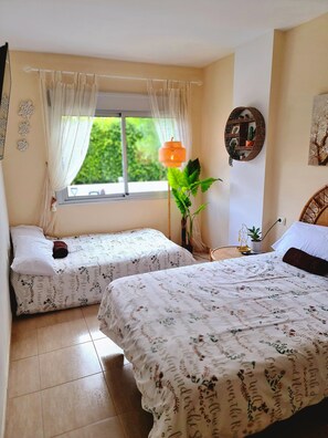 1 bedroom, desk, iron/ironing board, travel cot