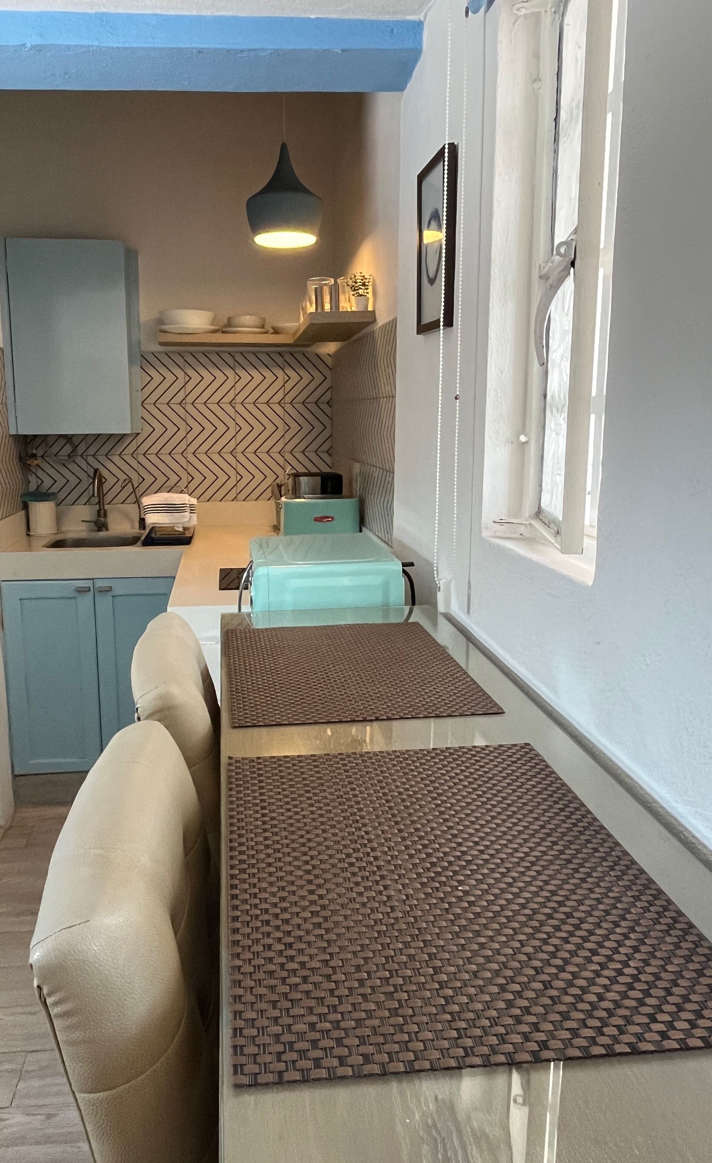 Fridge, microwave, stovetop, coffee/tea maker