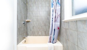 Basic Room, 1 Bedroom, Non Smoking | Bathroom | Combined shower/tub, soap, shampoo, toilet paper - Yellow Pillow inn (Niagara Falls)