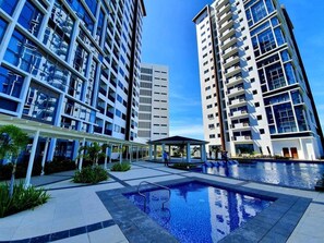 Outdoor pool, open 6:00 AM to 10:00 PM, lifeguards on site - The Mactan Newtown (Lapu-Lapu)