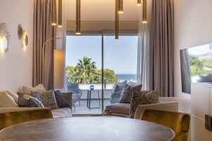 Executive Suite, 1 King Bed, Terrace, Sea View | Living area | 55-inch flat-screen TV with cable channels, heated floors, printers