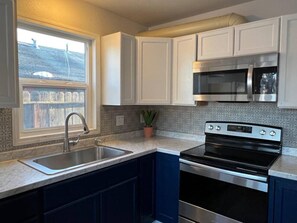 Fridge, microwave, oven, coffee/tea maker